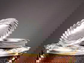 A SET OF TWELVE 18TH CENTURY STERLING SILVER DINNER PLATES, LONDON, 1791, JAMES YOUNG: A SET OF TWELVE 18TH CENTURY STERLING SILVER DINNER PLATES, LONDON, 1791, JAMES YOUNG the George III (Georgian) solid silver dinner plates of circualr form with gadrooned rims, each with an engraved h