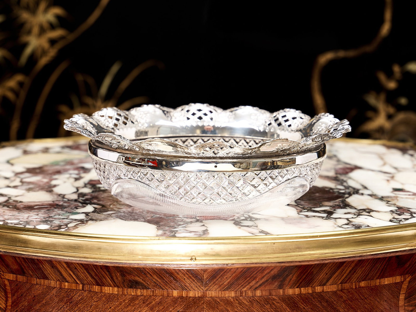 A VICTORIAN SILVER MOUNTED CUT GLASS FRUIT BOWL, C.1895: A VICTORIAN SILVER MOUNTED CUT GLASS FRUIT BOWL, C.1895 the late 19th century cut glass bowl with pierced silver rim decorated with trellis work and flowers, hallmarked Birmingham, 1895, maker's mark