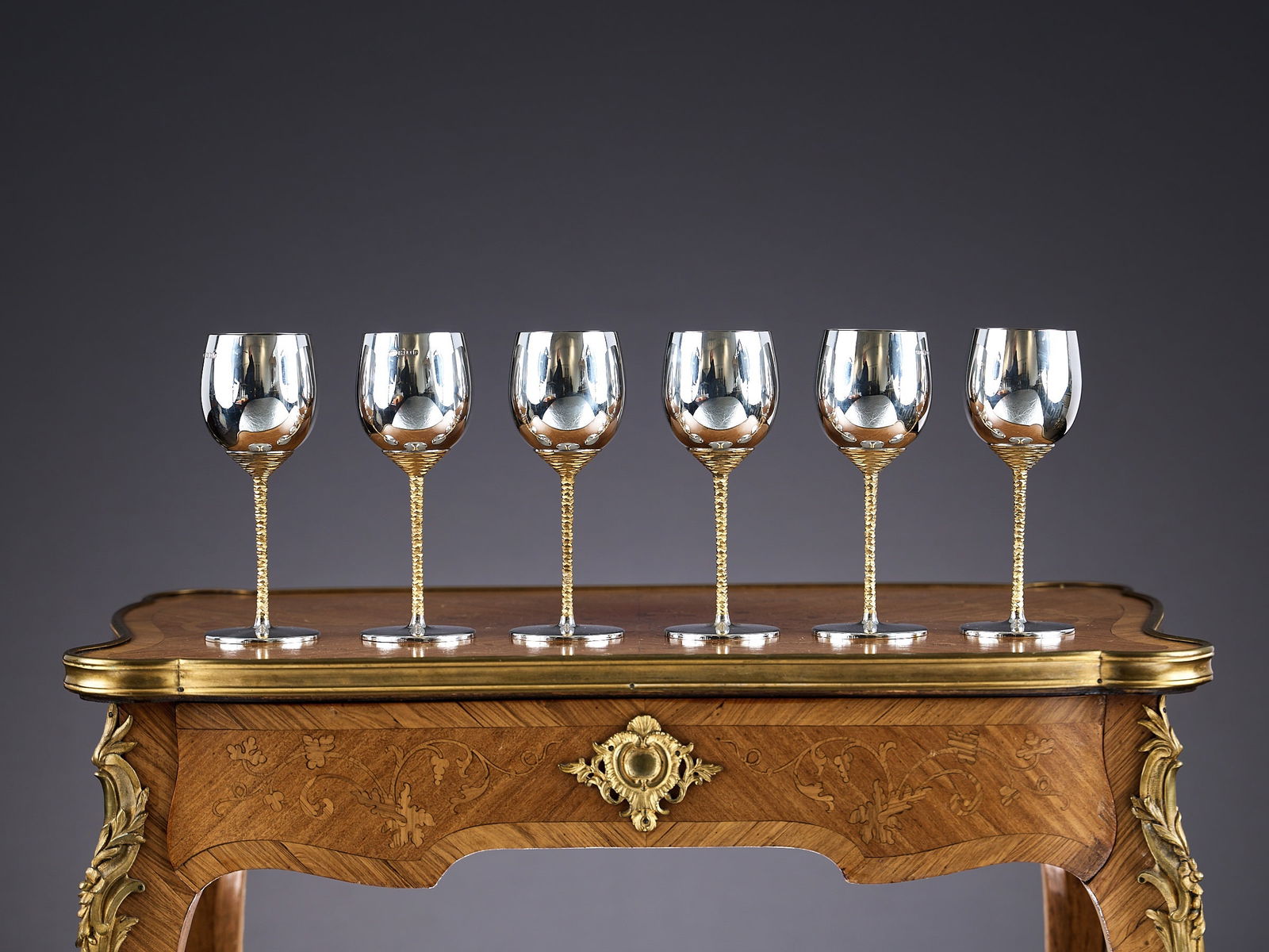 STUART DEVLIN: A SET OF SIX STERLING SILVER AND SILVER GILT MODERNIST WINE GOBLETS (1 of 1)