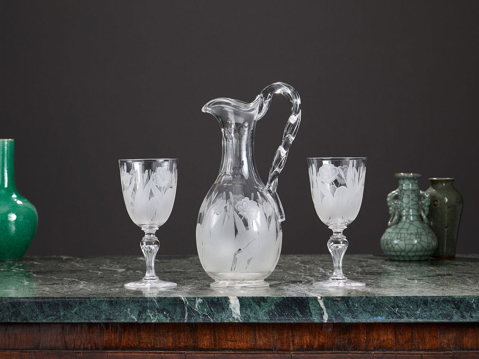 A MID 19TH CENTURY ENGRAVED GLASS WATER PITCHER AND TWO GLASSES (1 of 1)