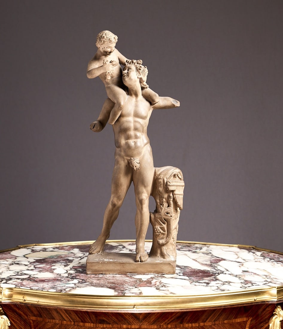 A LATE 19TH CENTURY TERRACOTTA FIGURAL GROUP OF A FAUN AND THE INFANT BACCHUS (1 of 10)