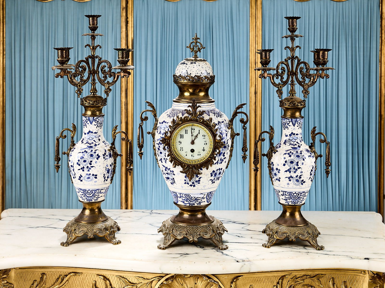 A LARGE JAPY FRERES GLAZED CERAMIC AND GILT METAL MOUNTED CLOCK GARNITURE (1 of 1)