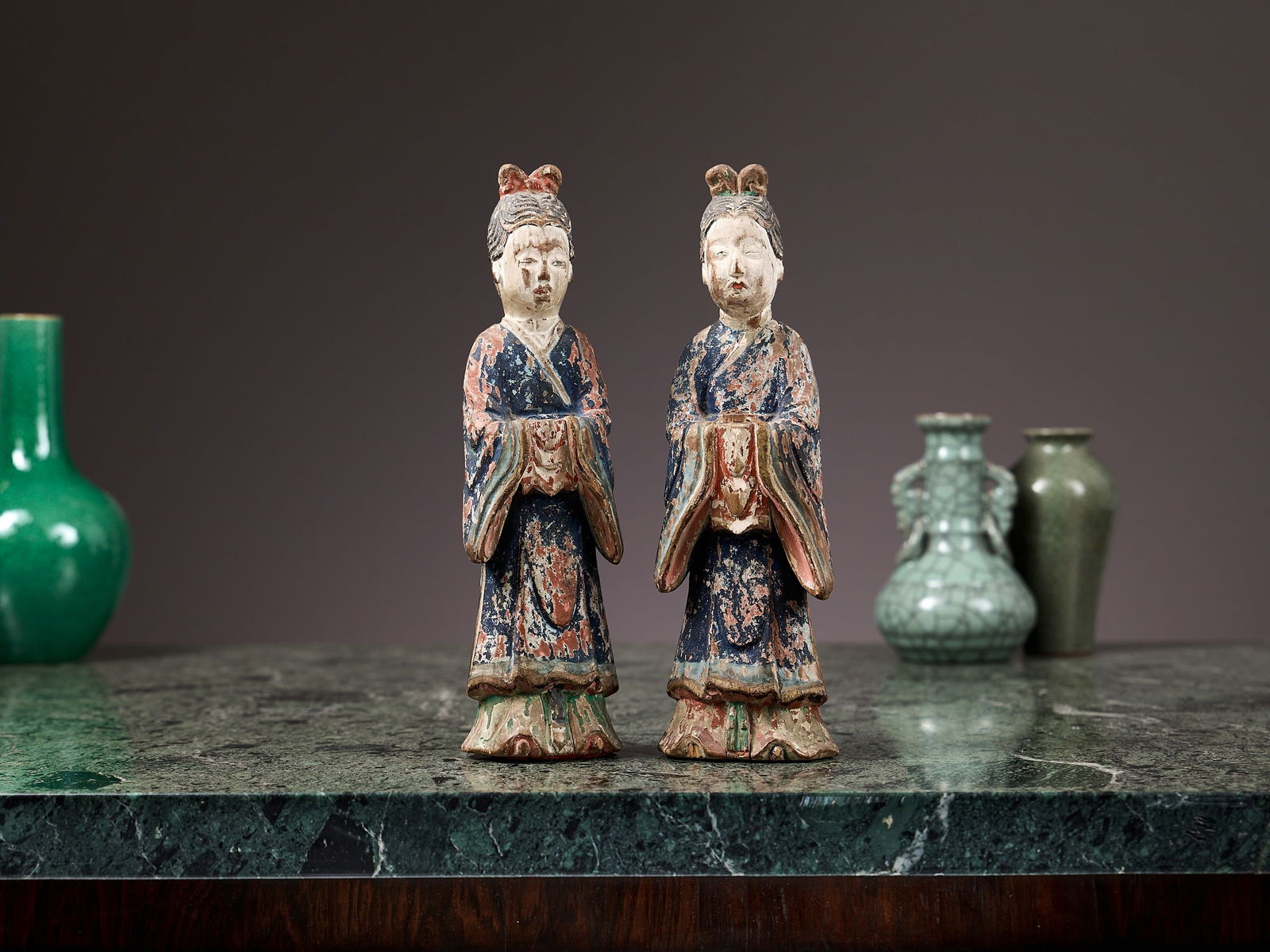 A PAIR OF CHINESE POLYCHROME DECORATED FIGURES OF COURT LADIES, PROBABLY MING DYNASTY (1 of 1)