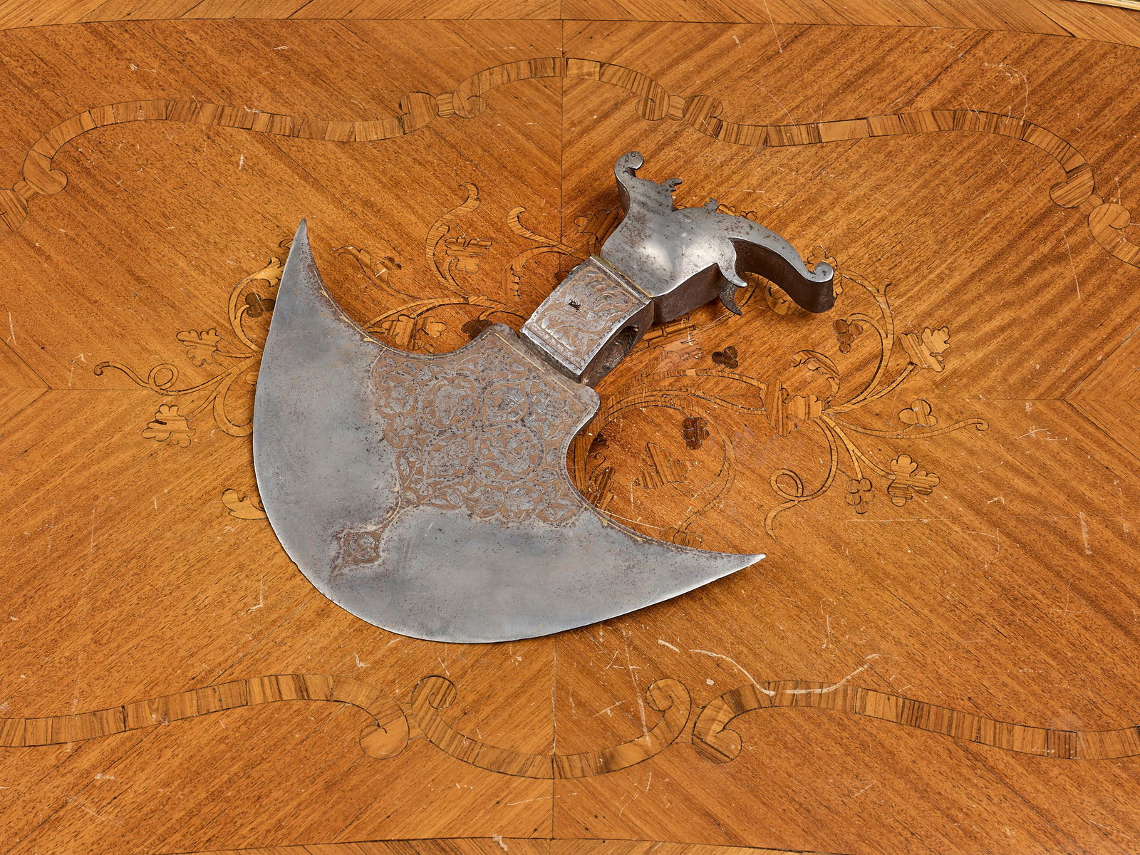 A 19TH CENTURY INDO PERSIAN SILVER DAMASCENED STEEL AXE HEAD (1 of 1)