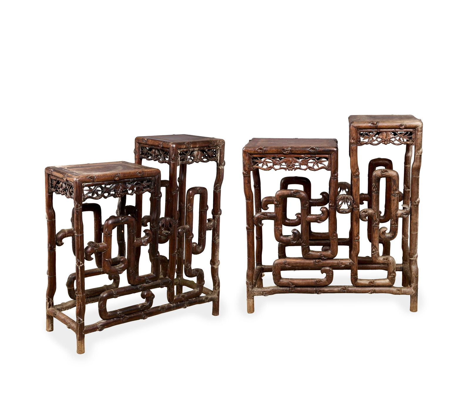 A PAIR OF CHINESE CARVED HARDWOOD TWO TIER TABLES (1 of 1)