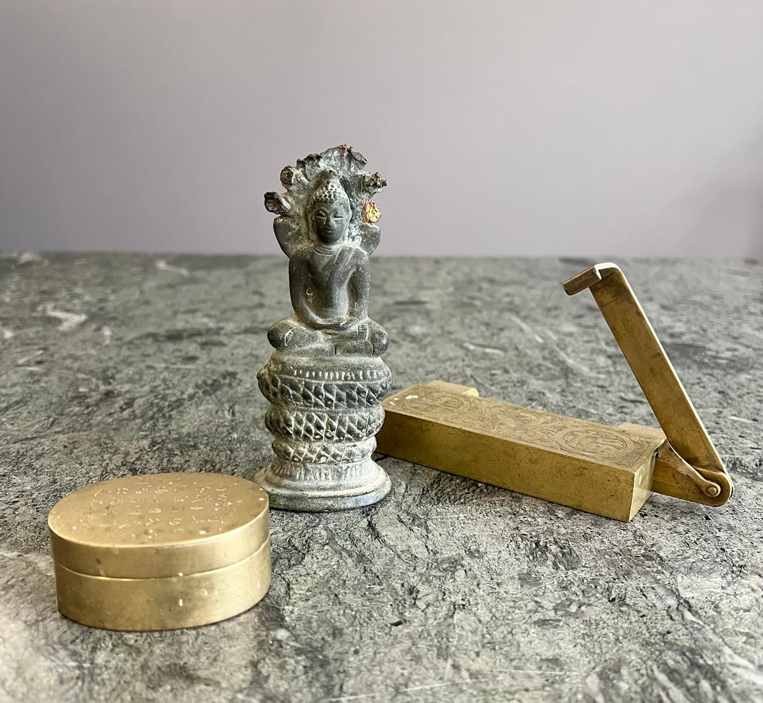 A CHINESE BRASS SLIDING LOCK TOGETHER WITH TWO OTHER ITEMS: A CHINESE BRASS SLIDING LOCK TOGETHER WITH TWO OTHER ITEMS the lock with sliding mechanism, late 19th / 20th century, with engraved foliage and Chinese characters to the sides 'Good Fortune', together