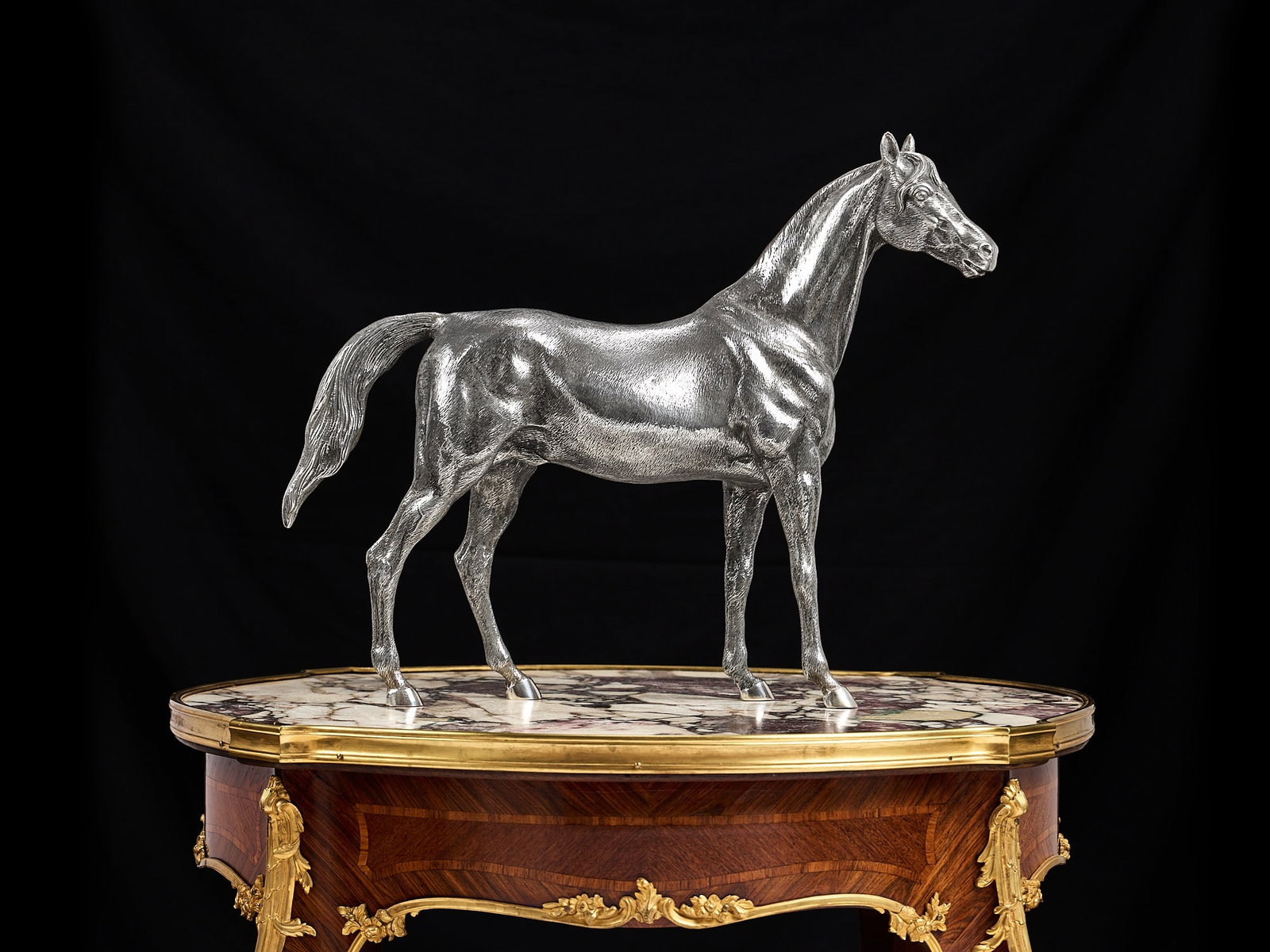 A LARGE SPANISH SILVER MODEL OF A HORSE: A LARGE SPANISH SILVER MODEL OF A HORSE probably by Vera Orfebres, Spanish circa 1980, in the style of the French sculptor Pierre Jules Mene, the Arab or thoroughbred stallion realistically modelled s