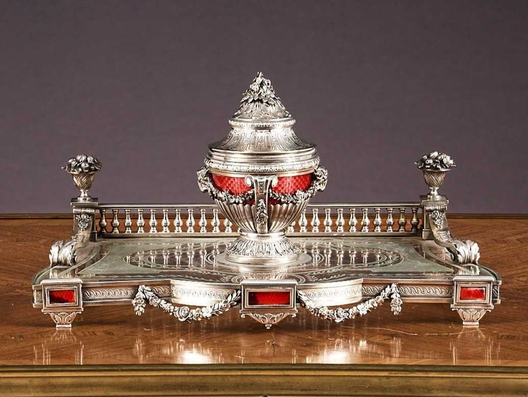 A FINE LATE 19TH CENTURY FRENCH SILVER AND ENAMELLED NEO-CLASSICAL INKSTAND: A FINE LATE 19TH CENTURY FRENCH SILVER AND ENAMELLED NEO-CLASSICAL INKSTAND the encrier of architectural form, modelled as a classical urn inkpot on an etched glass platform with balustrade behind, wi