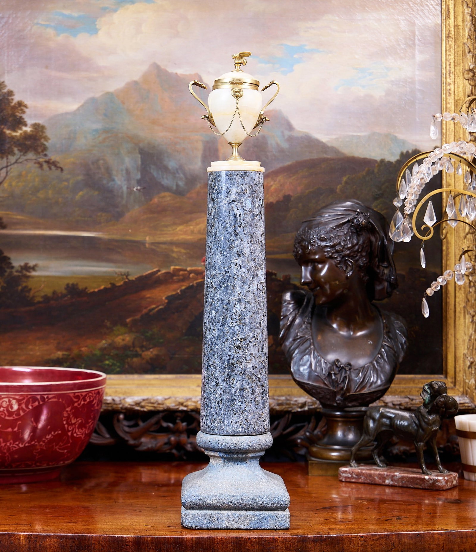 A 19TH CENTURY GRAND TOUR MODEL OF A CLASSICAL URN ON STAND: A 19TH CENTURY GRAND TOUR MODEL OF A CLASSICAL URN ON STAND designed as an ormolu mounted, alabaster urn with domed, hinged cover surmounted by a bee finial, with twin handles and hung with chains, mo