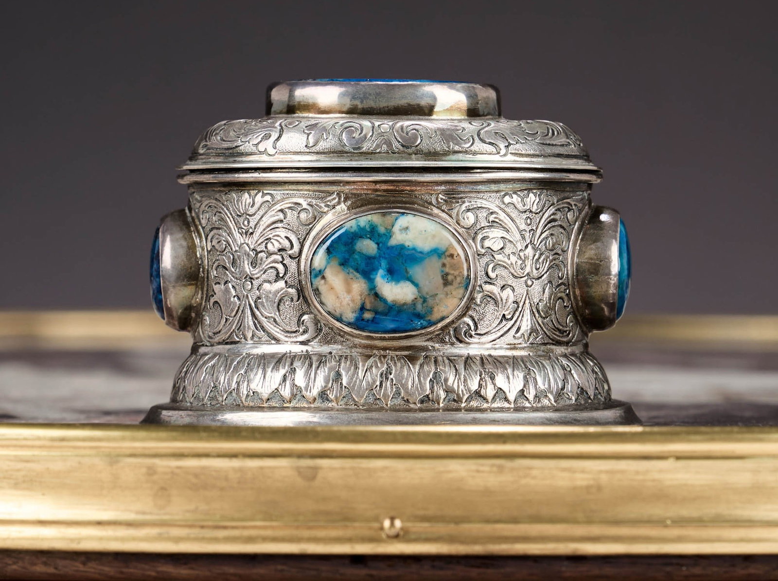 A FINE 19TH CENTURY GERMAN SILVER AND LAPIS LAZULI CASKET, HANAU C. 1890: A FINE 19TH CENTURY GERMAN SILVER AND LAPIS LAZULI CASKET, HANAU C. 1890 in the Renaissance style, of oval form on an oval foot, with foliate band to the base, the body with acanthus leaves on a textu