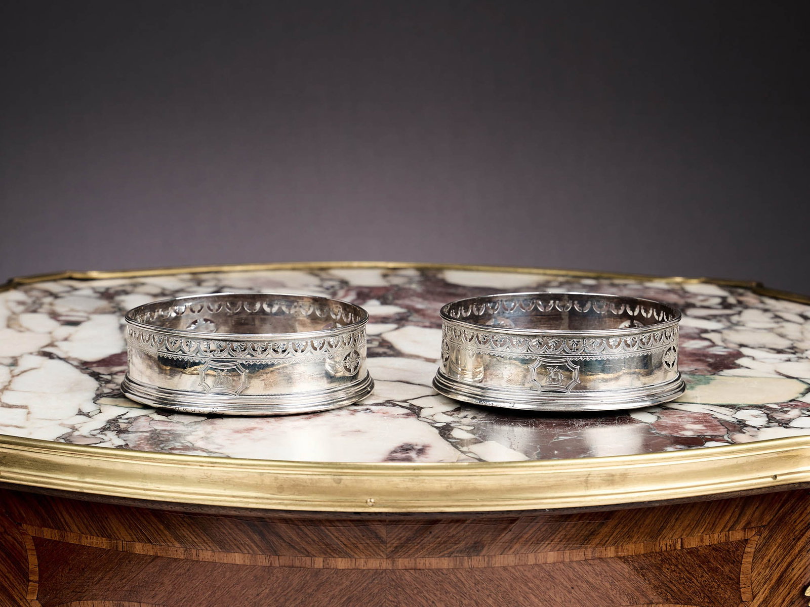 A PAIR OF GEORGE III STERLING SILVER WINE COASTERS (1 of 1)