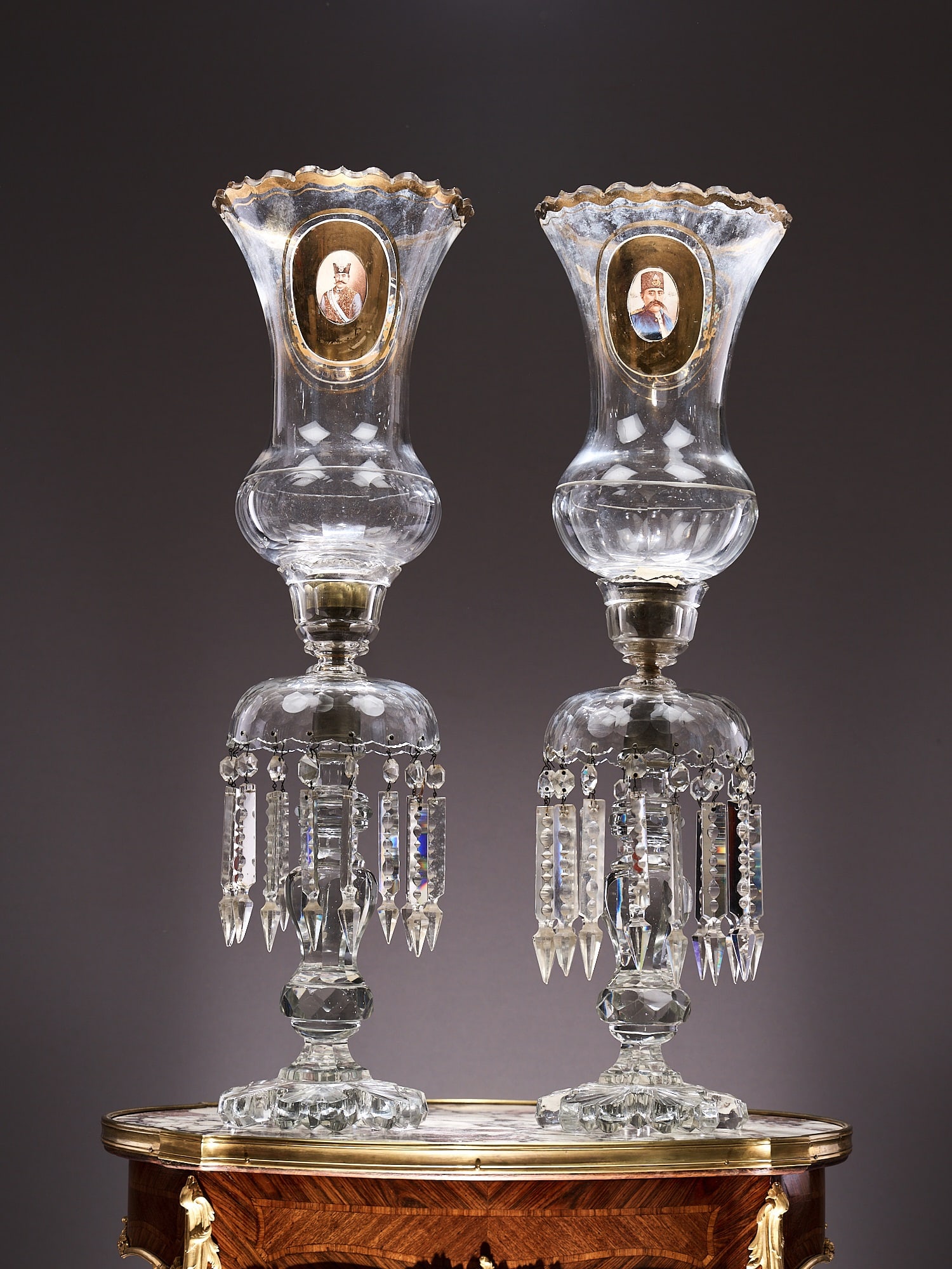 A LARGE PAIR OF EARLY 20TH CENTURY BOHEMIAN CLEAR GLASS LAMPS DEPICTING SHAH NASER AL-DIN (1 of 6)