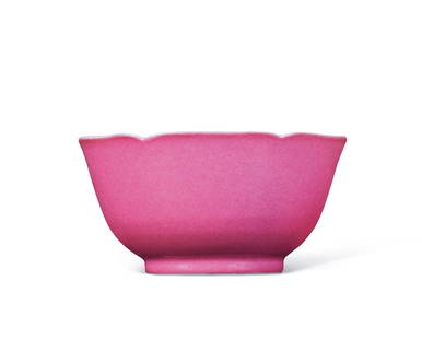 A PINK-GLAZED FLOWER-SHAPED CUP Period of Yongzheng, Qing Dynasty: 6.9 cm Diam.