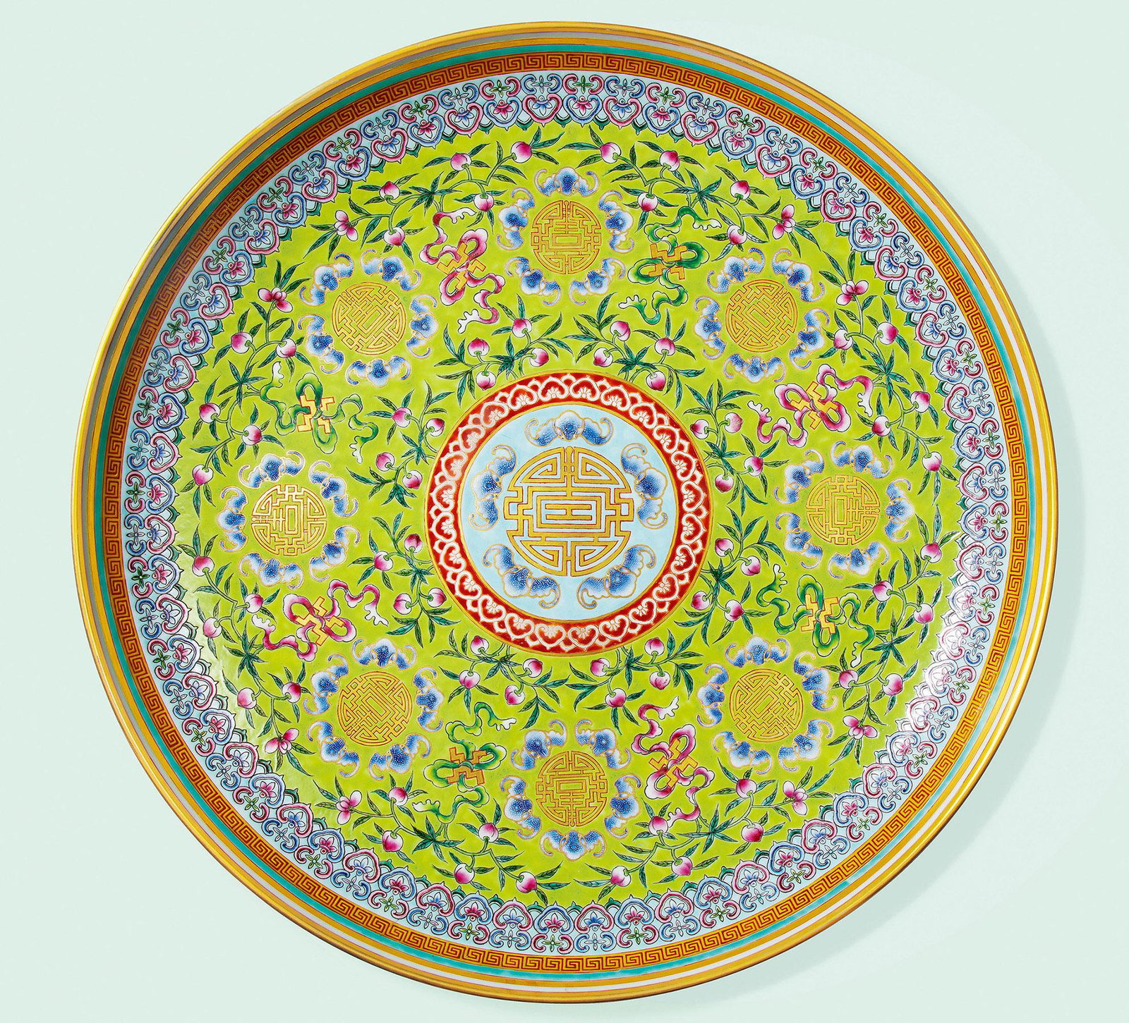 A RARE GREEN-GROUND FAMILLE-ROSE GILT-DECORATED 'BAT AND SHOU' DISH Period of Guangxu, Qing Dynasty (1 of 2)