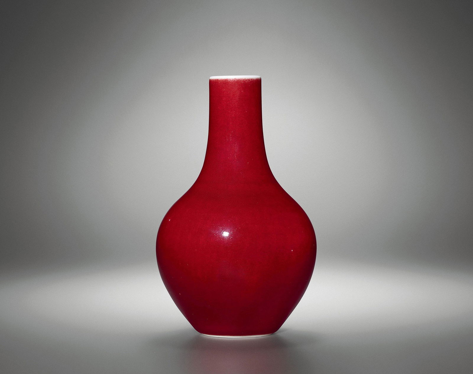 A RED-GLAZED VASE Period of Qianlong, Qing Dynasty (1 of 1)