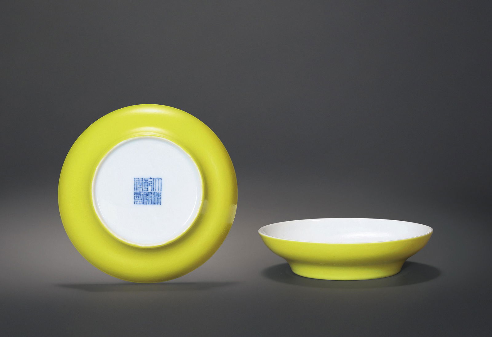 A PAIR OF LEMON-YELLOW-GLAZED DISHES Seal Mark and Period of Qianlong, Qing Dynasty (1 of 3)