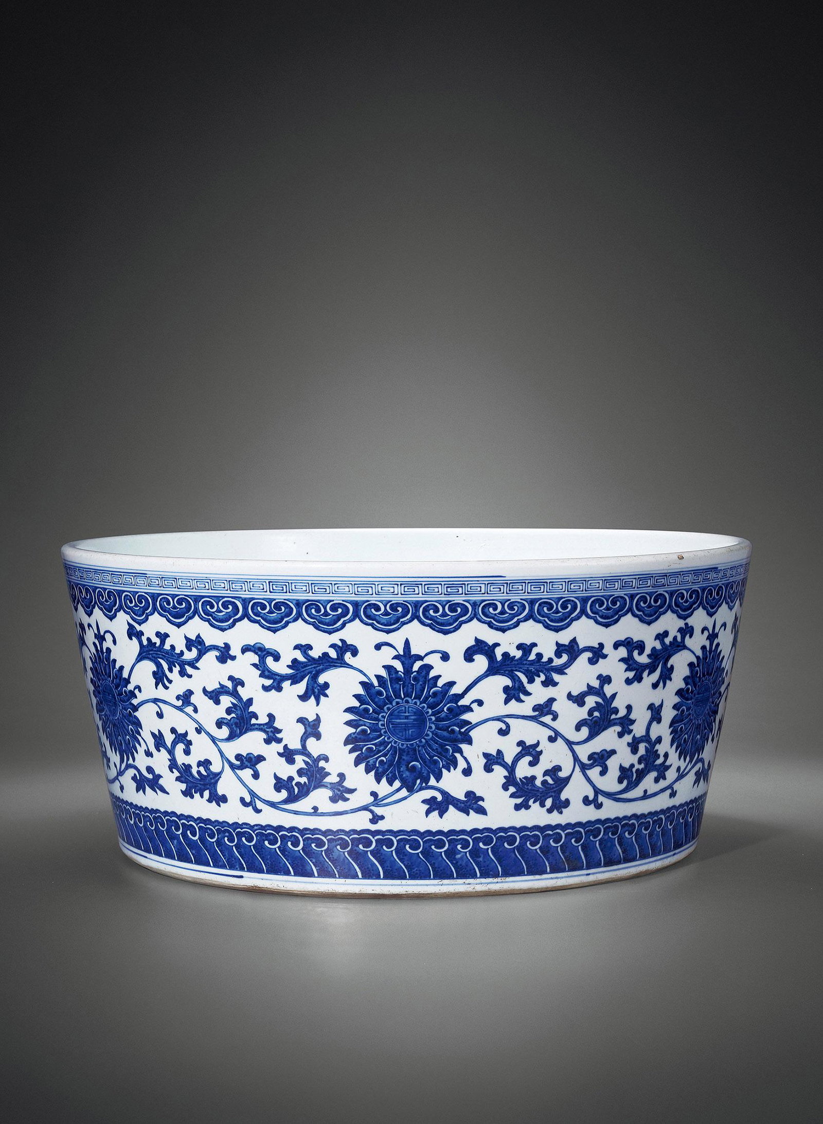 A BLUE AND WHITE 'INTERLOCKING FLOWER' JAR Period of Qianlong, Qing Dynasty (1 of 2)