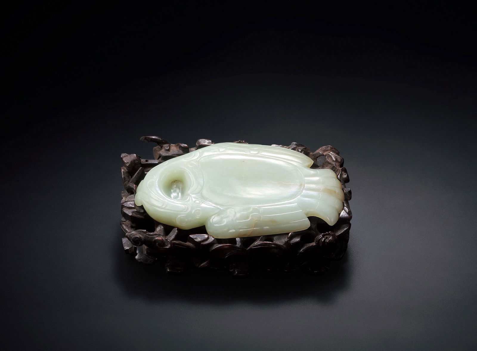 A CELADON JADE 'PHOENIX' INKSTONE Ming Dynasty (1 of 2)