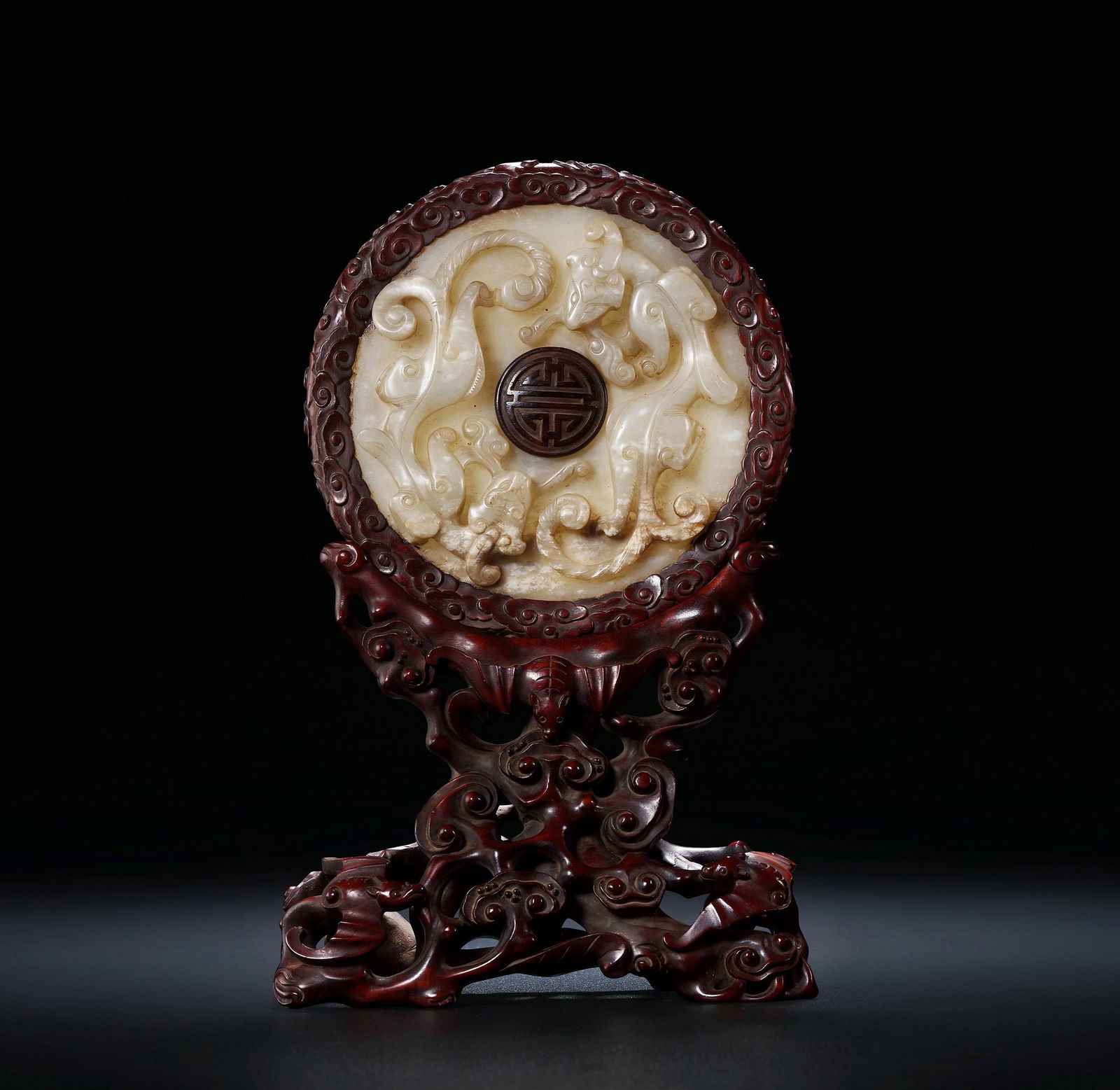 A WHITE JADE 'DRAGON' MOULDED PLATE Yuan Dynasty (1 of 1)