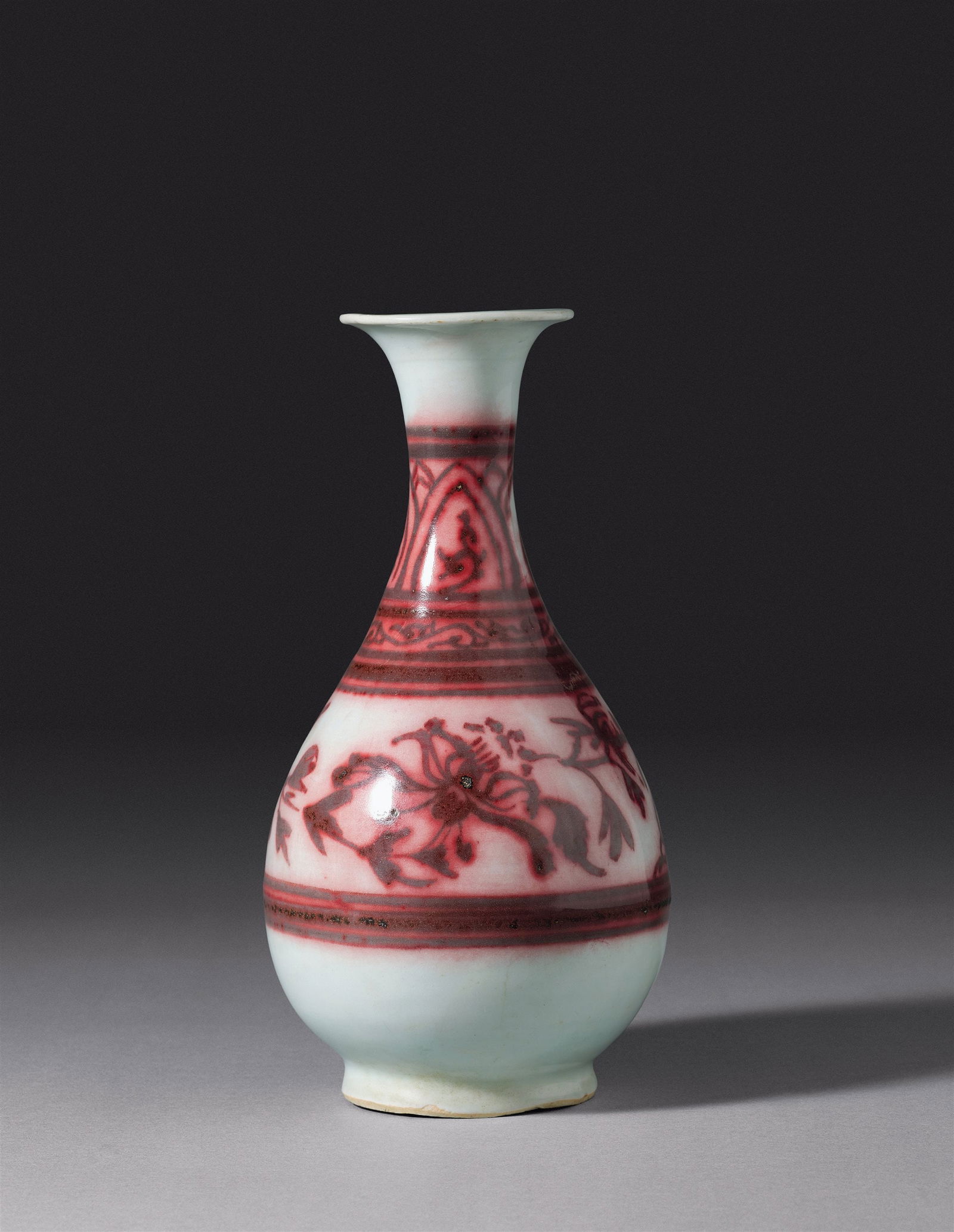 An Underglaze-red Yuhuchun Vase with Pruned Floral Scrolls (1 of 1)