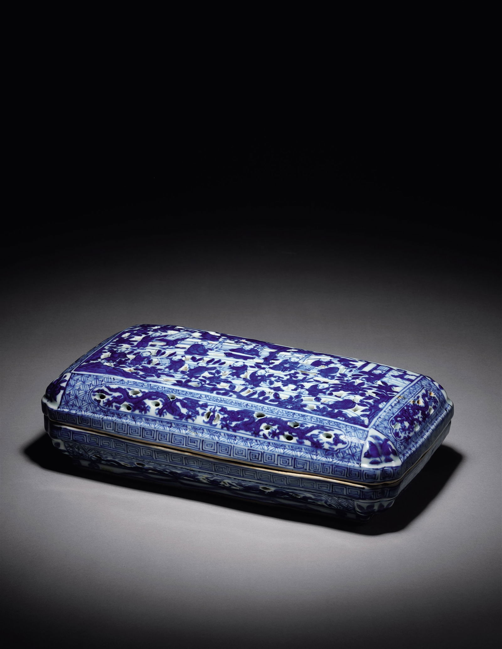 A BLUE-AND-WHITE COVERED BOX WITH CHILDREN-PLAY-AT-GARDEN: Mark and Period of Wanli, Ming Dynasty