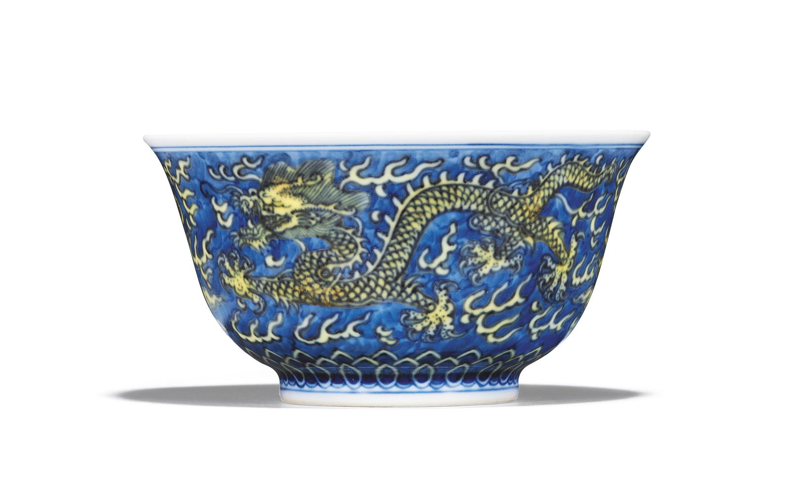 A Blue-and-white-ground Yellow-enamelled Cloud and Dragon Teacup: Mark and Period of Kangxi, Qing Dynasty