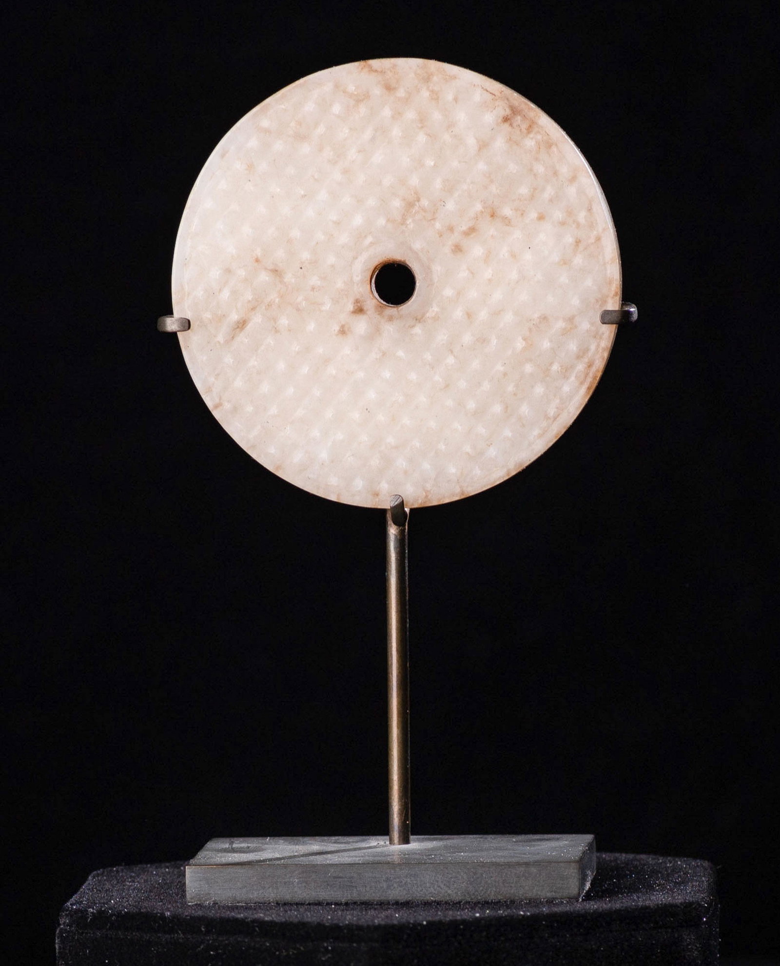 A grain pattern jade Bi, Han Dynasty (1 of 10)