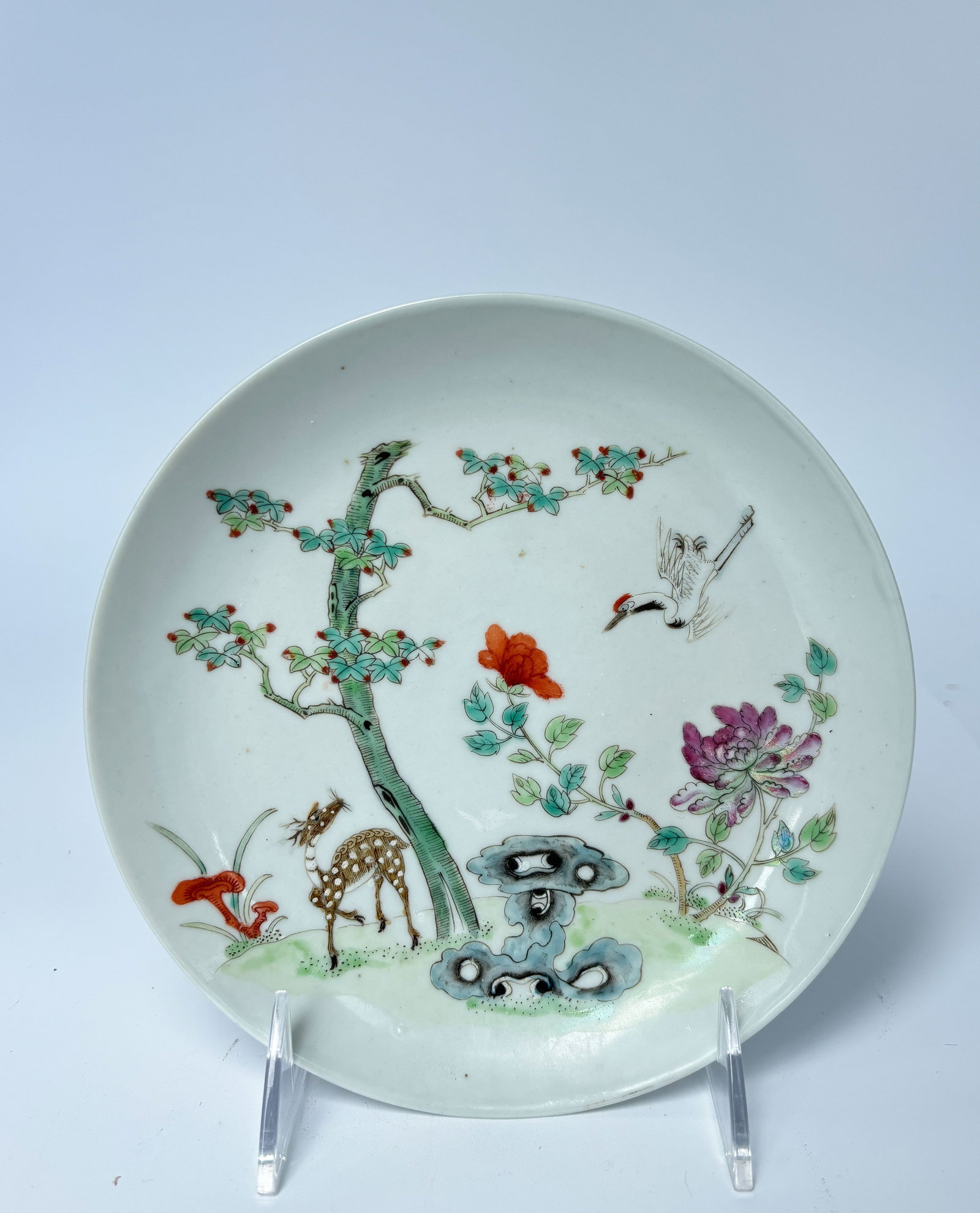 A Chinese Crane and Deer Pattern Porcelain Plate, Qing Dynasty Tong Zhi Period: D: 17.7cm, H: 2.9cm 清同治 鶴鹿同春瓷盤 直徑17.7釐米，高2.9釐米 The Condition report's description