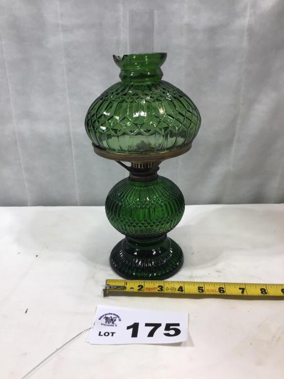GREEN OIL LAMP, DAMAGE ON TOP GLOBE: GREEN OIL LAMP, DAMAGE ON TOP GLOBE