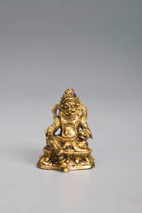 A gilding copper yellow Jambhala statue: A gilding copper yellow Jambhala statue Height: 3.4cm