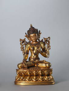 A copper green tara statue