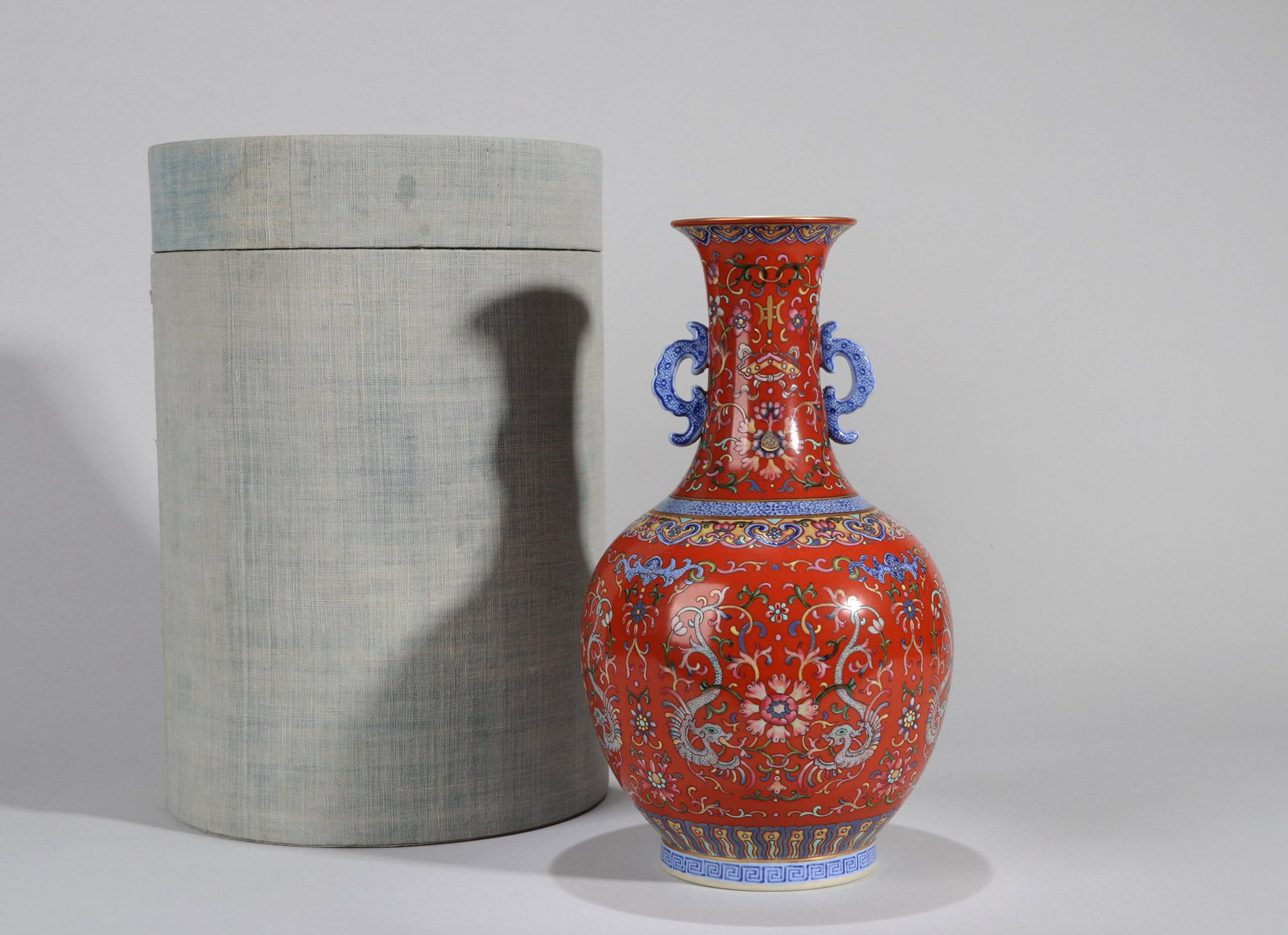 An iron red ground dragon and flower porcelain vase with original box (1 of 8)