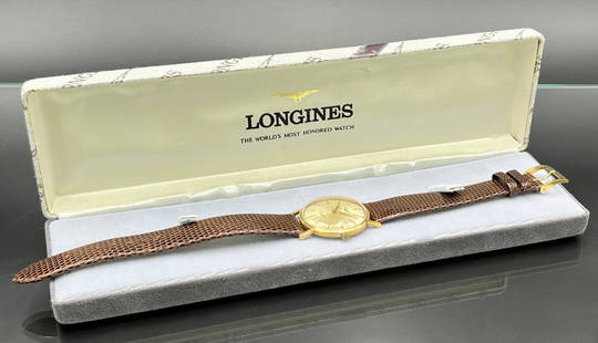 Vintage men's wristwatch LONGINES 750 yellow gold. Switzerland. 1960s/70s.: Approximately 36.7 grams total weight. Approximately 36 mm in diameter without crown. Case in 750 yellow gold. Champagne-coloured dial with Arabic inscription. Manual winding. Model number 16 / 259319