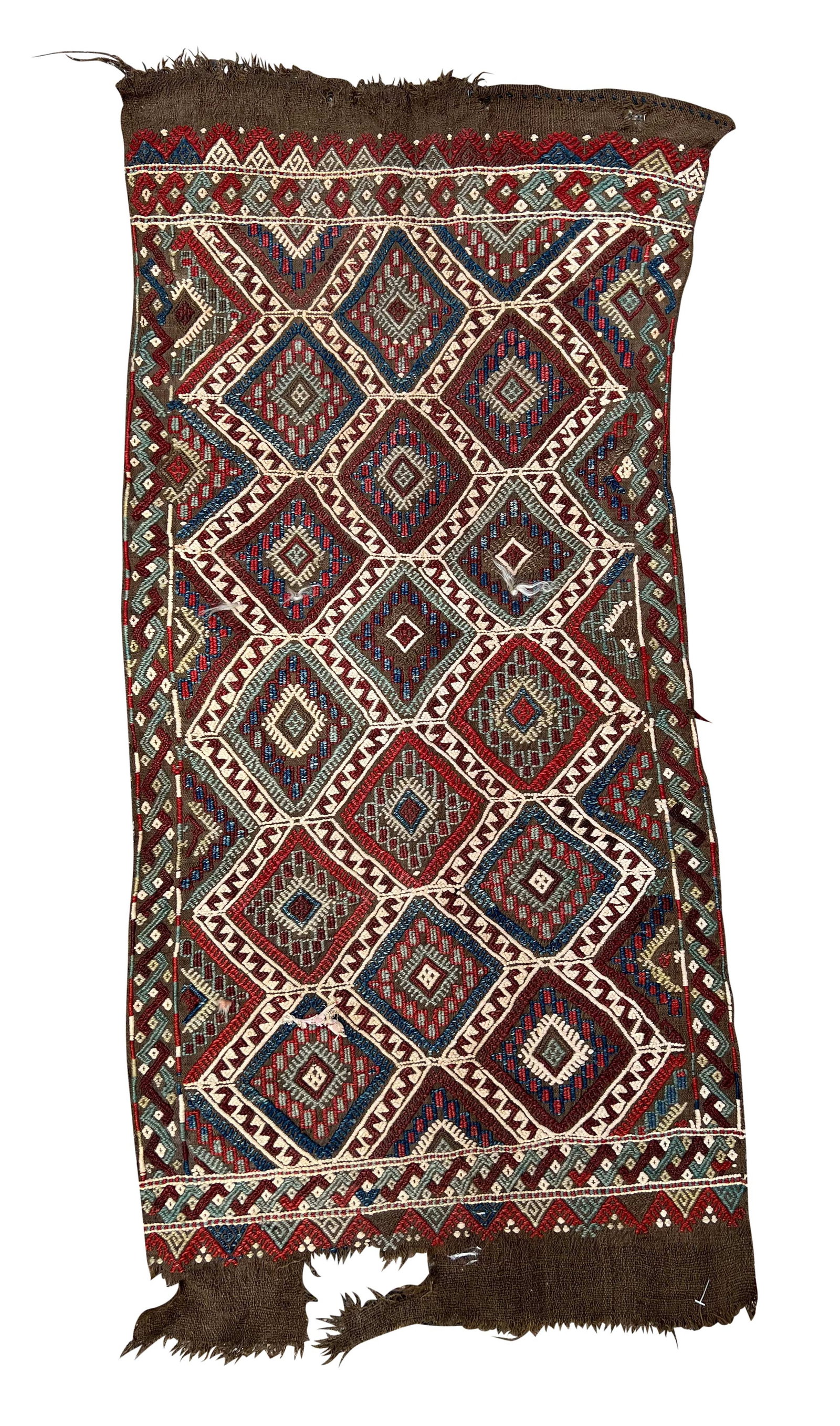 Jastek in sumak technique. Turkey. End of 19th century.: Approx. 113 cm x 55 cm. Handwoven. Wool on wool. Beautiful pattern and plant dyes. Partly open and damaged fringed sides. Condition see photos. Category: Carpets and textiles