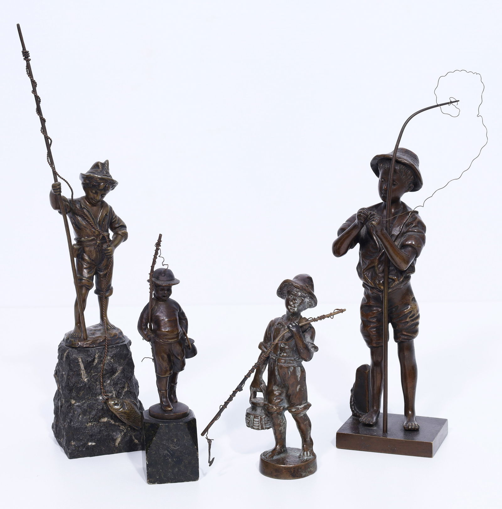 Set of 4 bronze figures. Fisher boys.: 4 bronze figures, dark patina. Fully sculpted representation of young anglers with fishing rods.1 figure by Adolphe Jean LAVERGNE (active 1863–1928), ‘Pêcheur’. Approximately 20