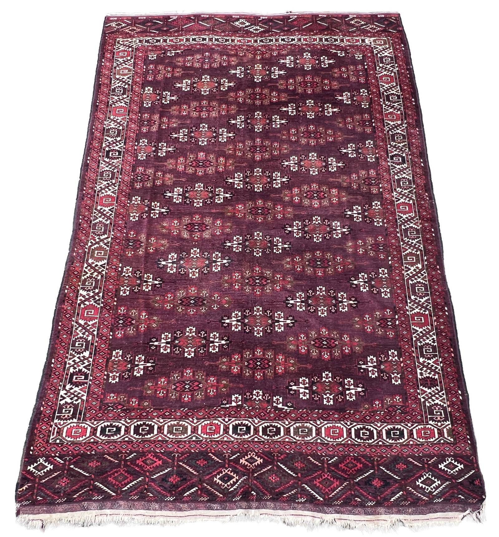 Turkmen main carpet. Approx. 324 cm x 209 cm. Circa 1900.: Oriental carpet. Hand-knotted. Wool on wool. Kilim ends partly open. Good condition considering its age. See photos. Category: Carpets and textiles