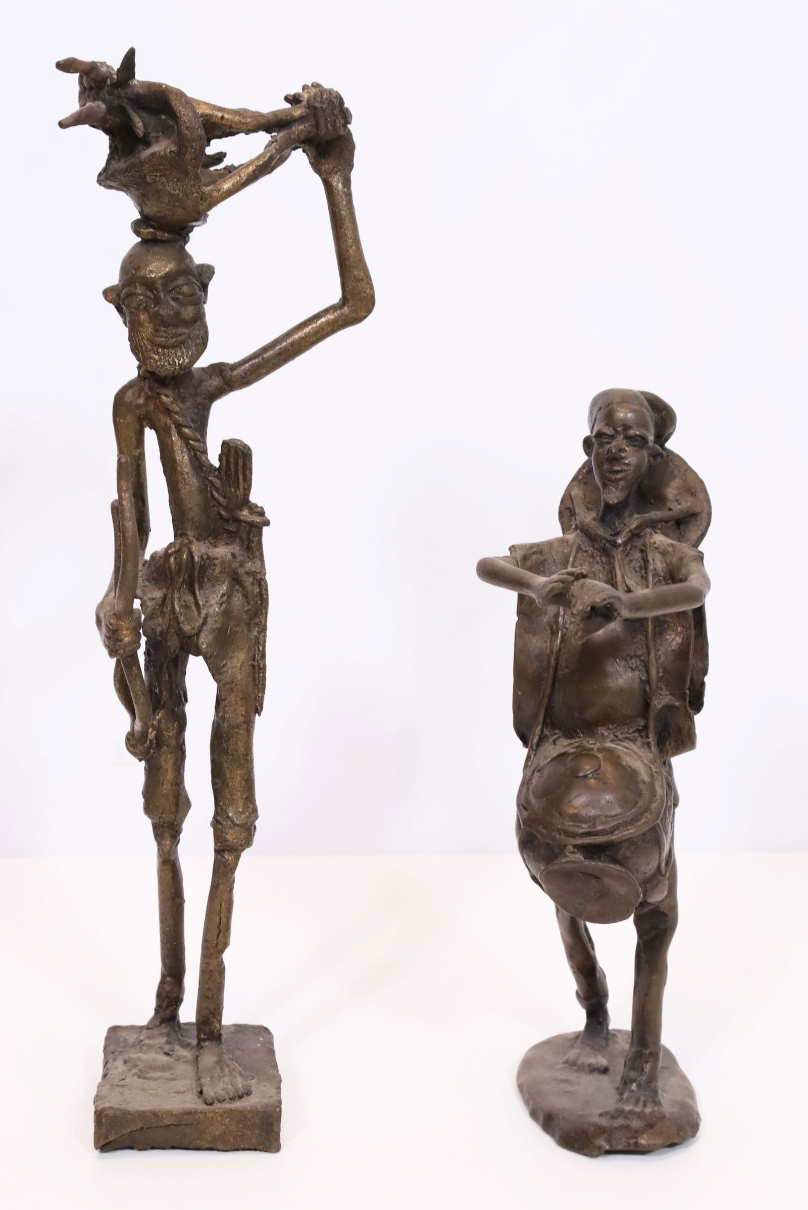 2 bronze figures. Water carriers. Drummers. Benin. Africa. First half of the 20th century. (1 of 10)