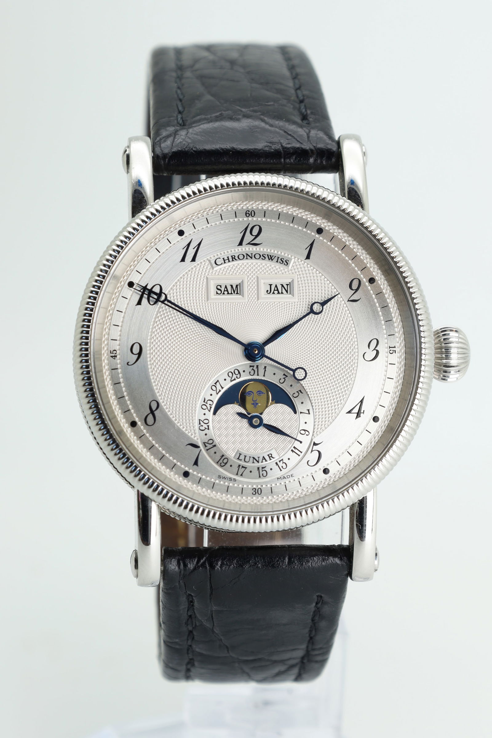 CHRONOSWISS. Lunar. Men's wristwatch. Full set. Switzerland.: Approx. 38 mm case diameter without crown. Ref. CH9323. Automatic. Movement runs. Accuracy not tested. Round stainless steel case with fluted bezel and onion crown. Blued Breguet hands on guilloch