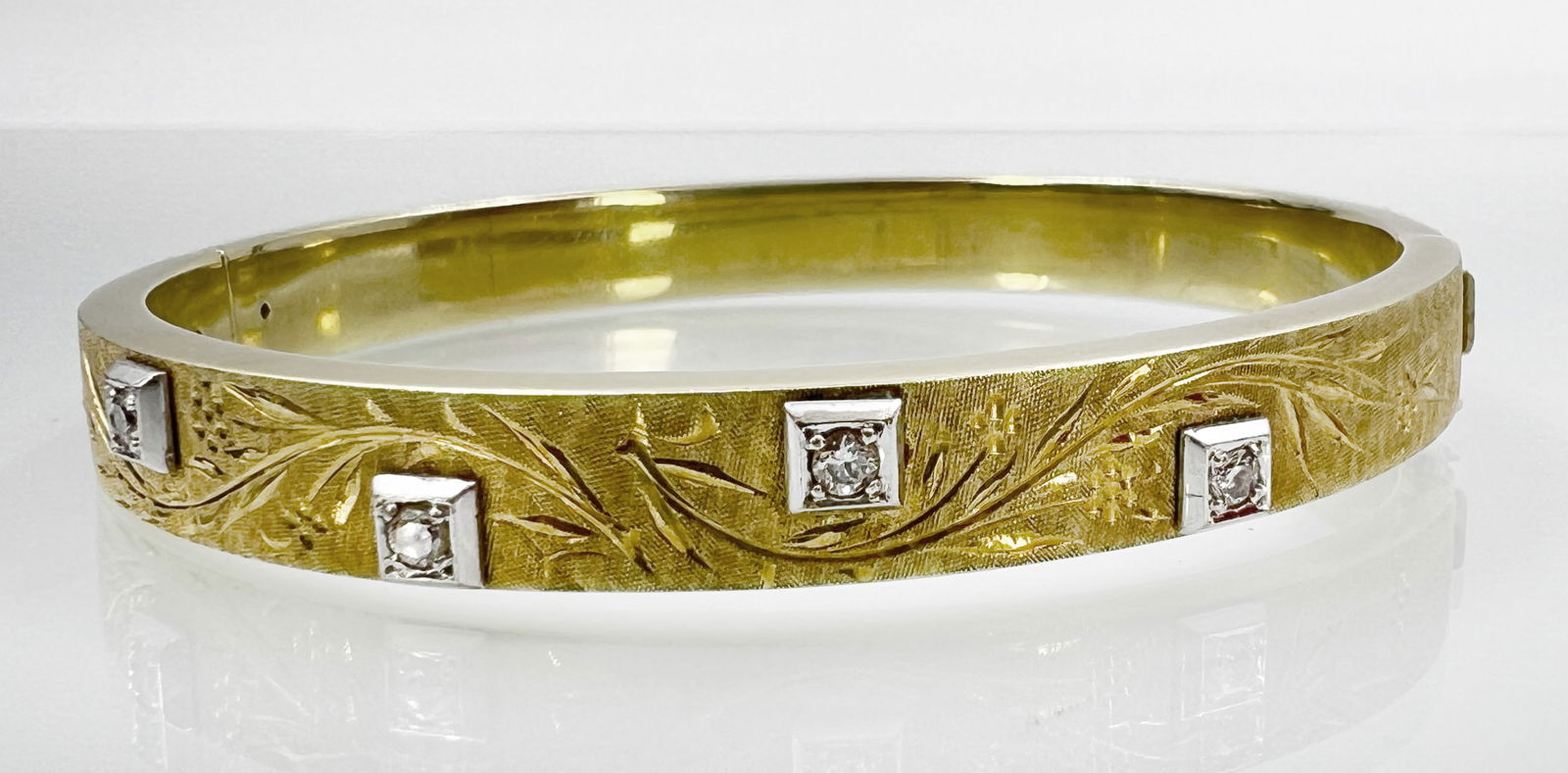 Bangle. 585 yellow gold and white gold with 4 small diamonds. (1 of 8)