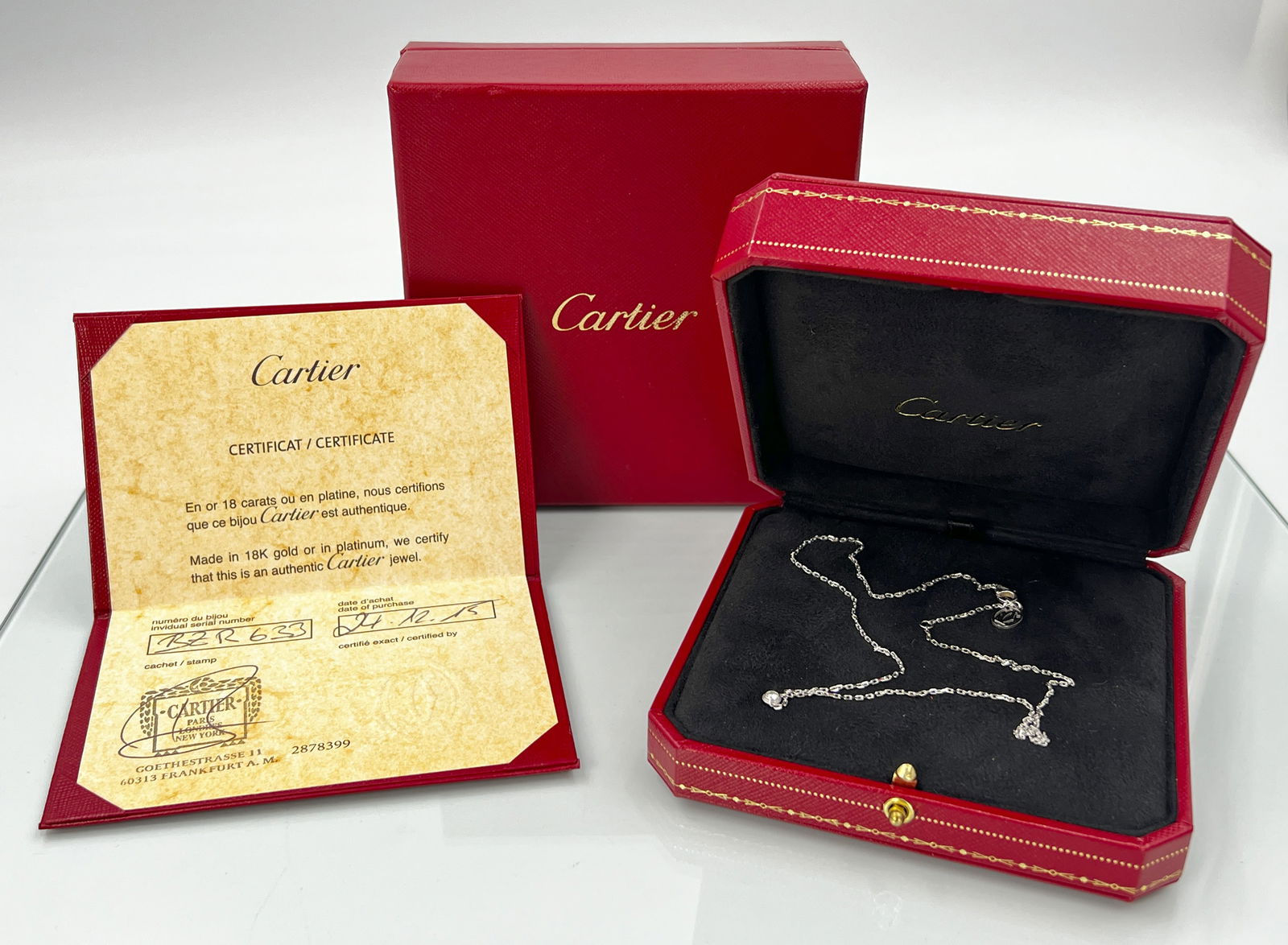 CARTIER. Pendant with necklace. 750 white gold with a small diamond. (1 of 9)