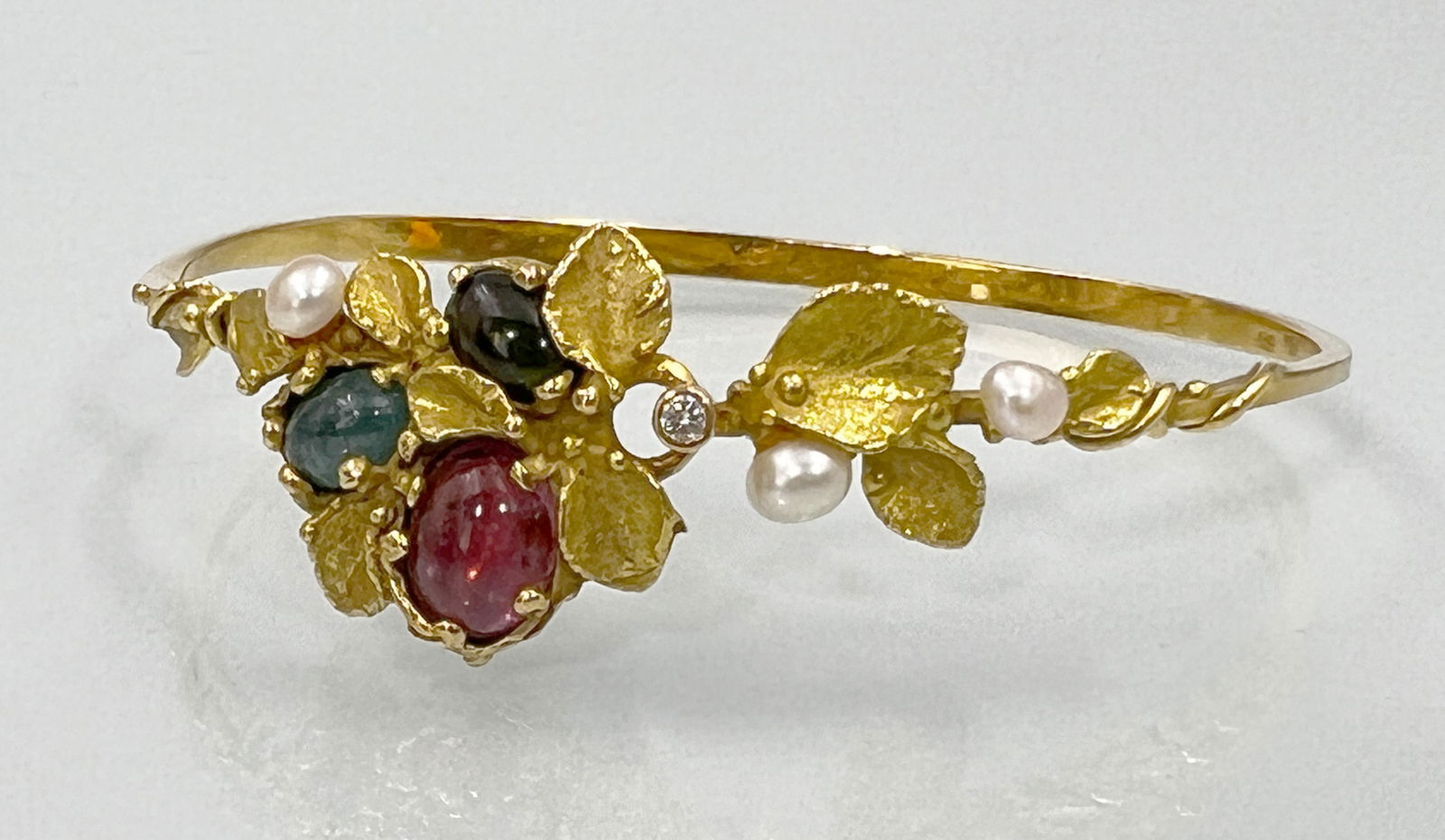 Bangle. ‘Magnificence’ 750 yellow gold with diamonds, coloured stones and pearls. (1 of 8)