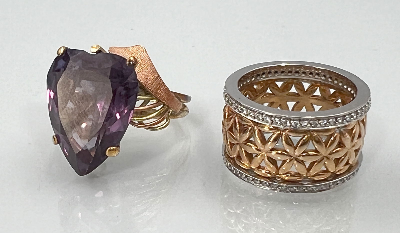 Two ladies' rings. 585 yellow gold, white gold and rose gold set with diamonds and coloured stones. (1 of 15)