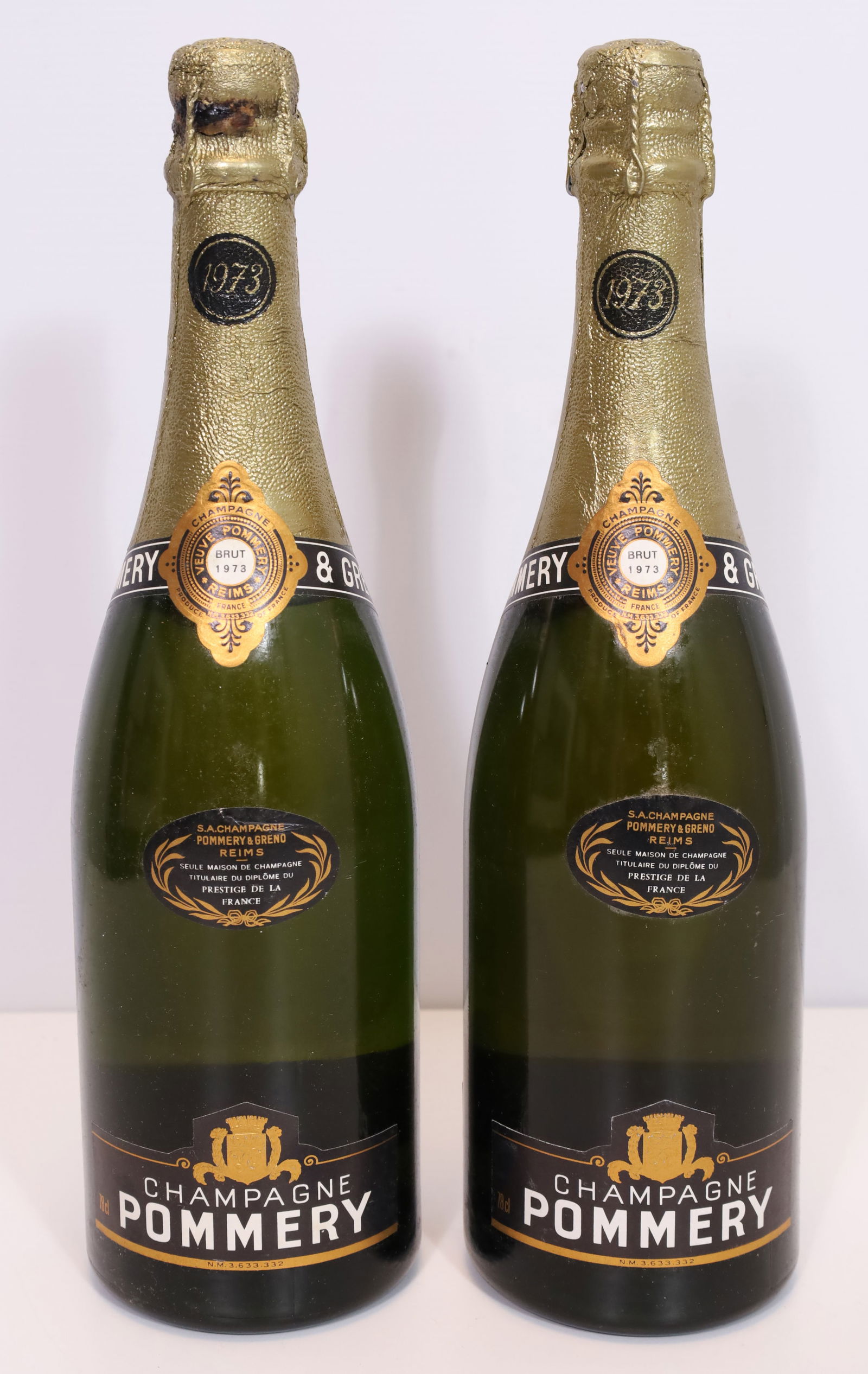 2 bottles of 1973 Champagne Pommery. France.: Vintage champagne. Pommery & Grone. 0.78 L each. Stored in an air-conditioned wine cellar. 1 bottle with low fill level. See photos for condition. Category: Champagne / WinesPlease note shipping