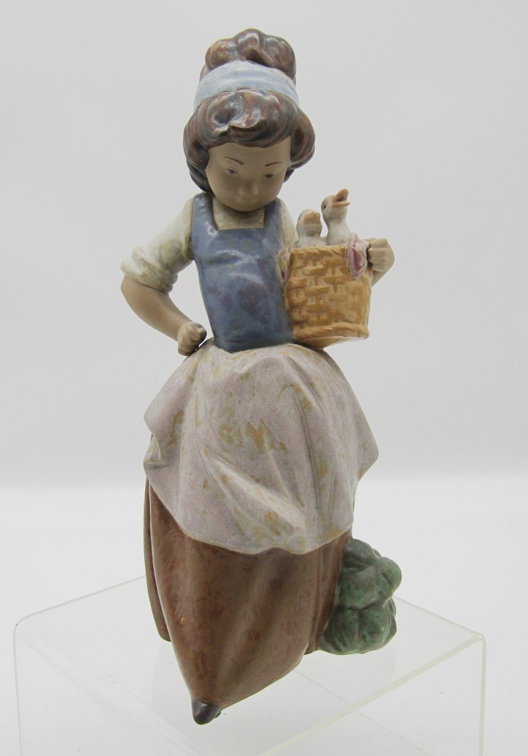 vintage Lladro figurine of girl with basket of ducklings (1 of 3)
