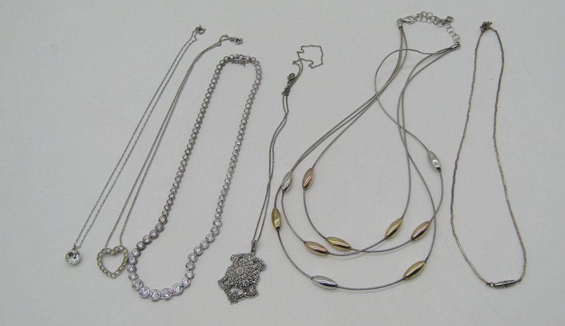 estate lot of 6 sterling necklaces: nice lot of sterling necklaces. multi strand, AR marcasite pendant, Rhinestone, pendant, etc. weighs 62 grams.