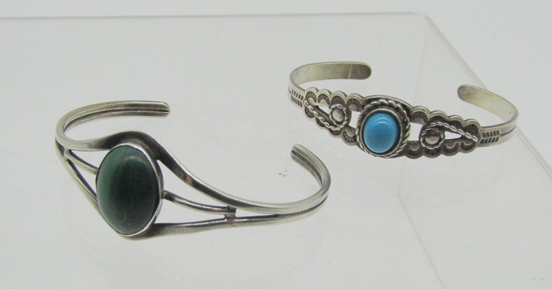 estate lot of 2 southwestern sterling cuff bracelets: includes Joseph Esposito with turquoise, cuff with malachite stone, T hallmark.