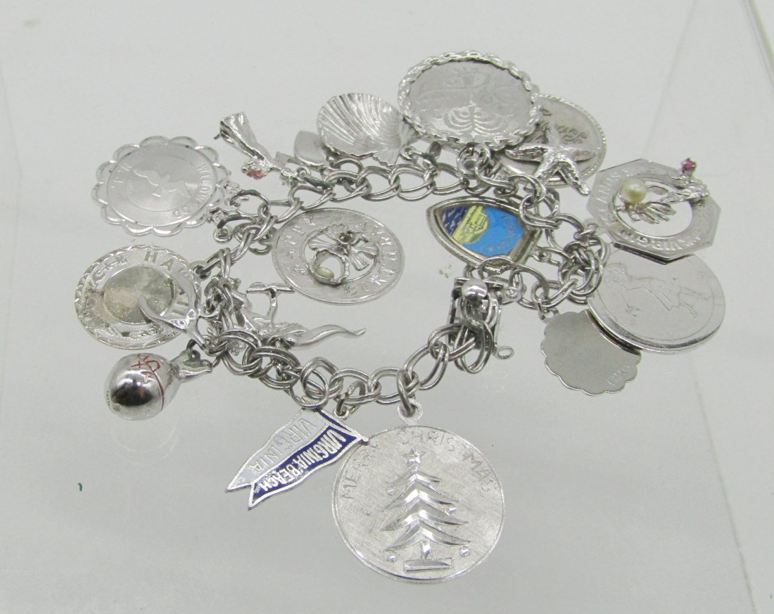 vintage sterling charm bracelet with many charms (1 of 2)