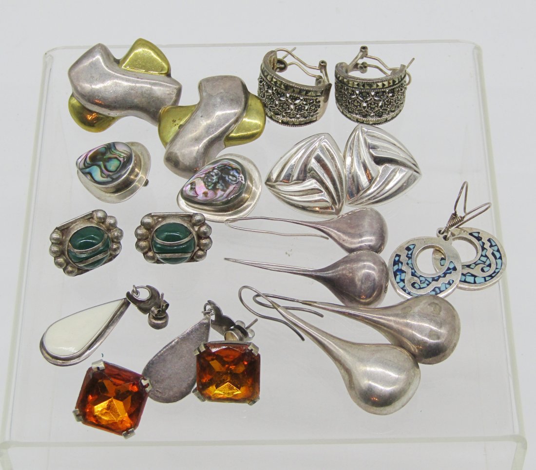 estate lot of 10 pair of vintage sterling earrings.: nice lot of vintage sterling earrings. Marcasites, stone, turquoise, etc. 126.5 grams tw.