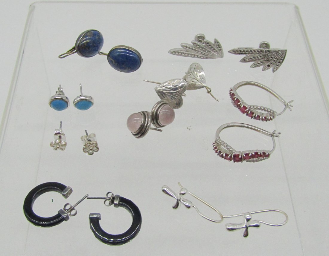 estate lot of 9 pair of vintage sterling earrings.: nice lot of vintage sterling earrings. lapis, ruby, turquoise, etc. 32.5 grams tw.