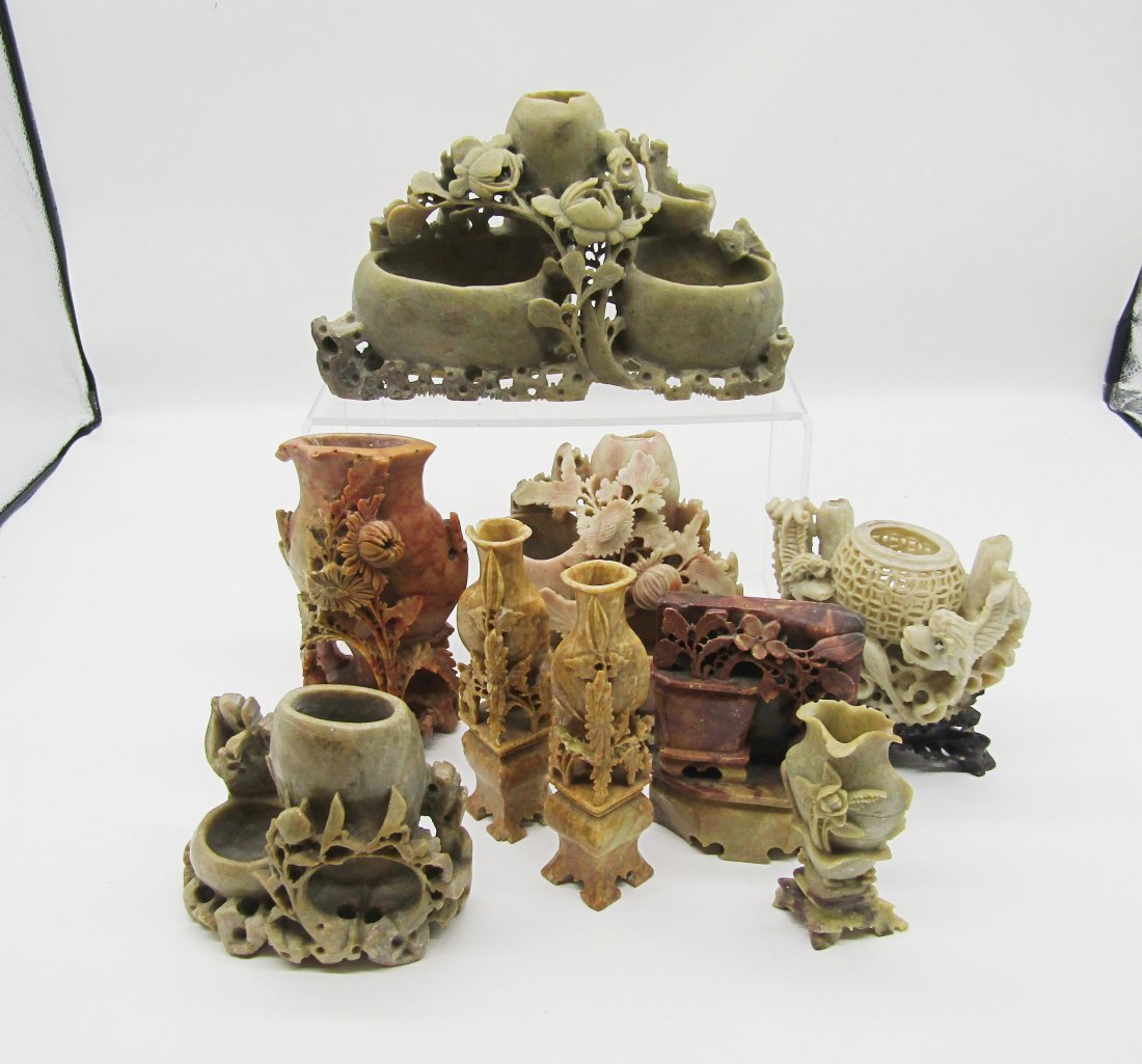 large grouping of soapstone carvings (1 of 4)